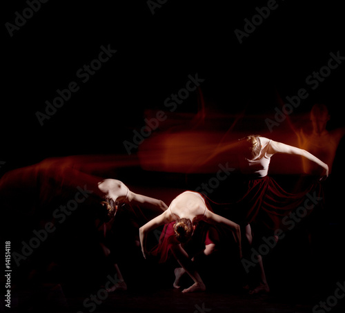 Fototapeta The sensual and emotional dance of beautiful ballerina