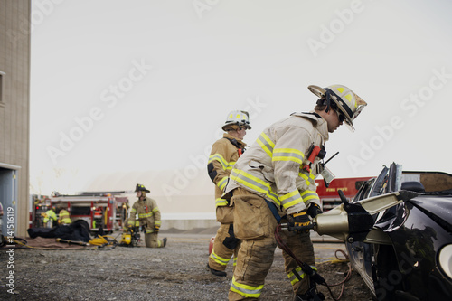 Portrait of firefighter in field