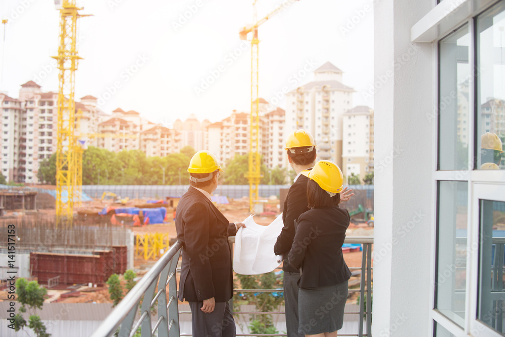 Team of engineers at the construction Team of engineers at the construction