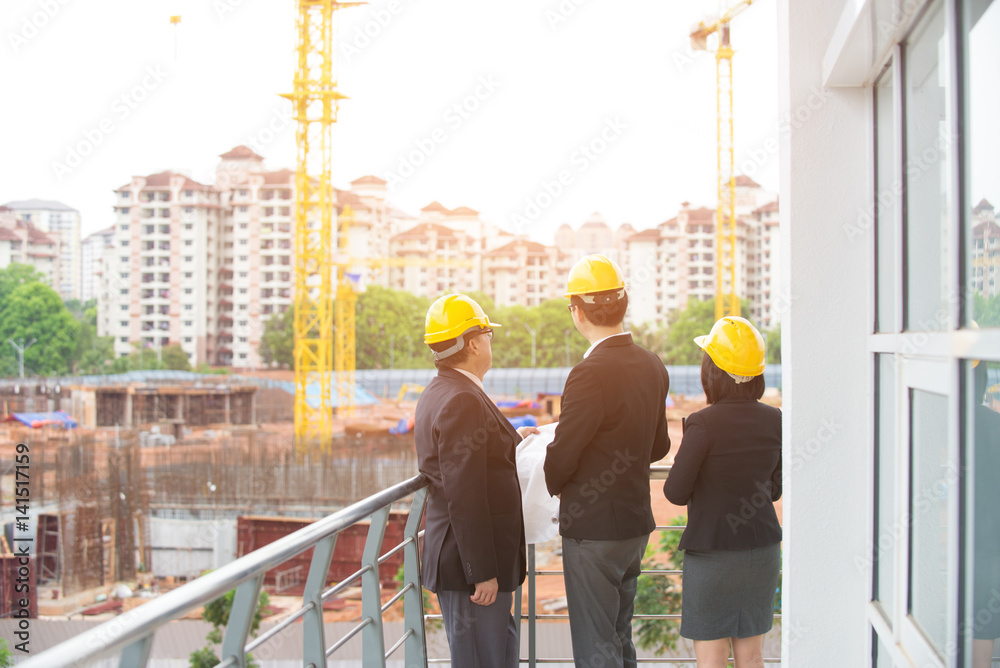 Team of engineers at the construction Team of engineers at the construction