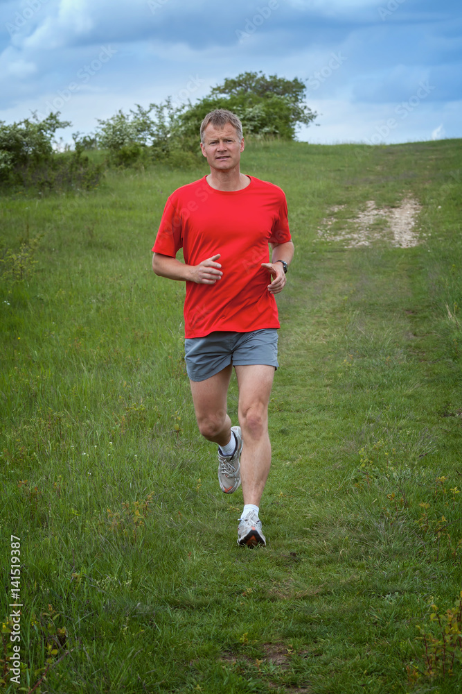 Young runner while training for a competition Young runner while training for a competition