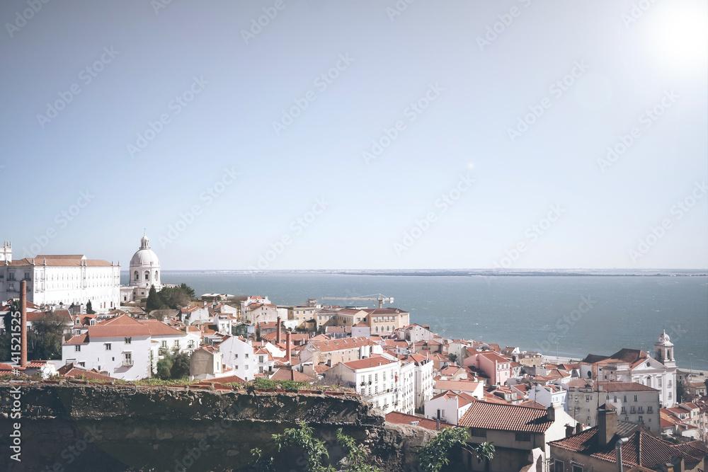 Lisbon Portugal cityscape with blue sky and sunlight Lisbon Portugal cityscape with blue sky and sunlight