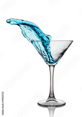 Splash in glass of a blue alcoholic cocktail drink © viktoriya89