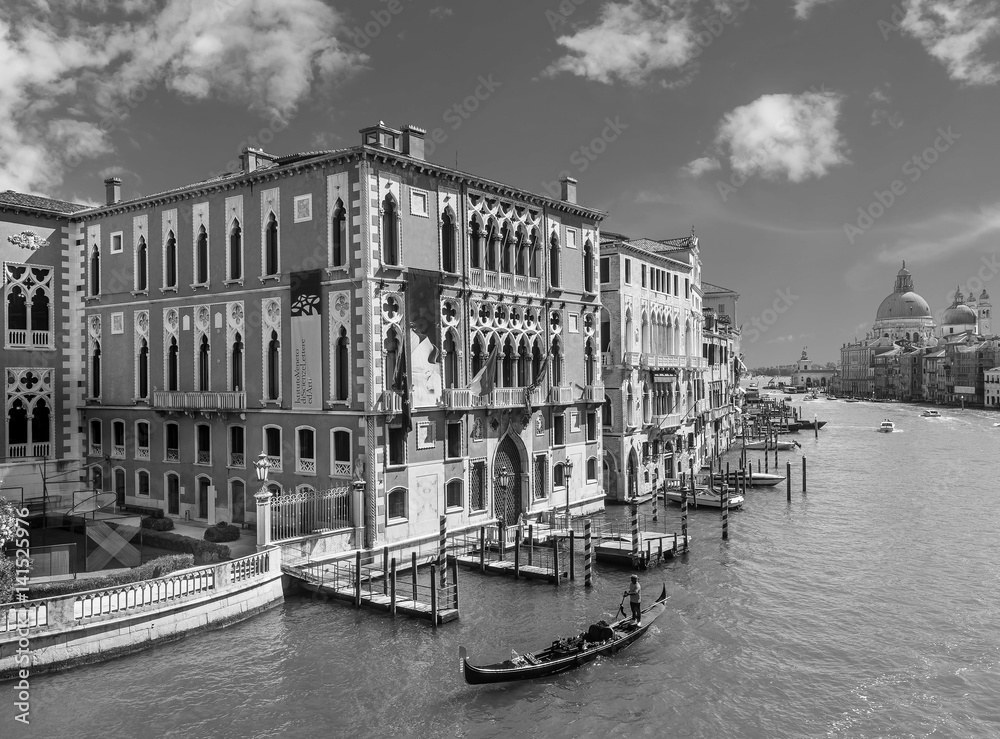 Aerial view of the Grand Canal from the Accademia Bridge towards the Basilica of Santa Maria della Salute, Venice, Italy, in black and white