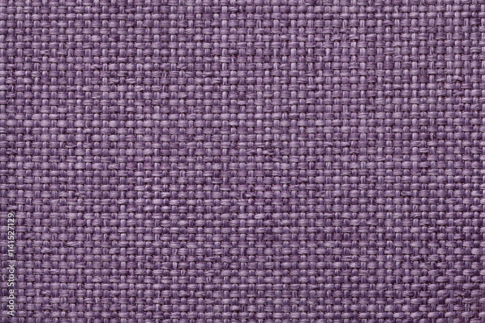 Purple background with braided checkered pattern, closeup. Texture of the weaving fabric, macro. Purple background with braided checkered pattern, closeup. Texture of the weaving fabric, macro.