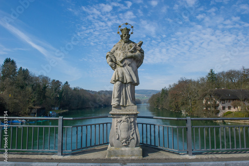 Statue of John of Nepomuk in frint of the Rhine River