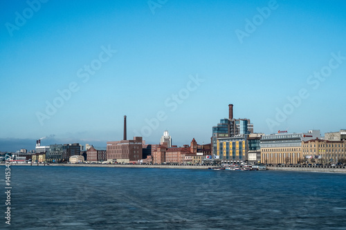 Saint Petersburg  Russia  03 05 2017 - Industrial winter view with frozen Neva river