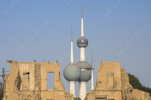 Kuwait towers view between ruins of old building