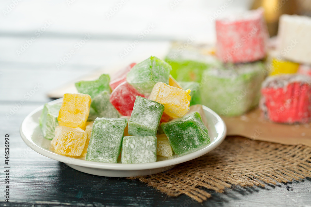 traditional eastern desserts on wooden background
