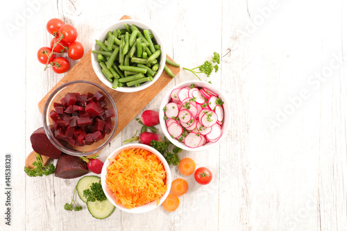 assorted vegetable salad and ingredients
