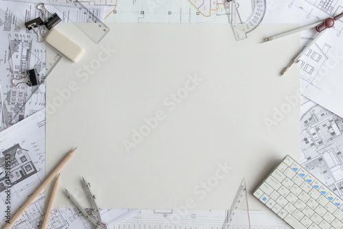 Architectural plans, pencil and ruler on the table. Place for your text