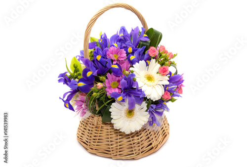   Flower arrangement in a pot  basket  on a white background  