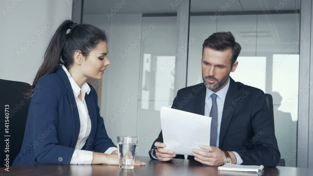 Job interview - recruiter talking with female candidate Job interview - recruiter talking with female candidate