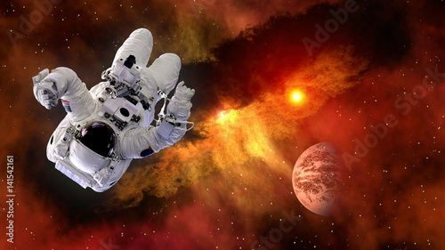 Astronaut planet Mars spaceman suit outer space gravity galaxy floating universe explosion. Elements of this image furnished by NASA.