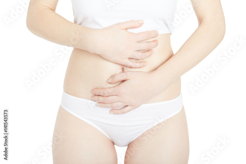 Woman with menstrual cramps, stomachache isolated on white, clipping path