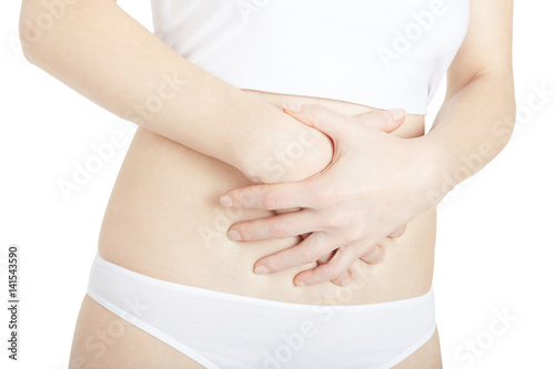 Woman with stomach pain isolated on white, clipping path