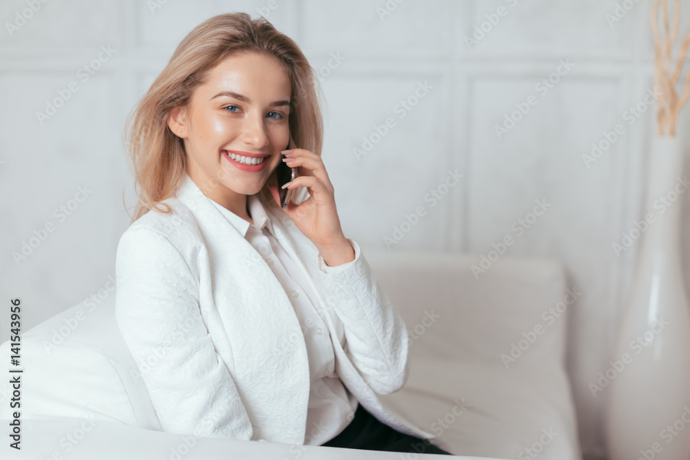 Portrait of beautiful young woman working in the office. Portrait of beautiful young woman working in the office.