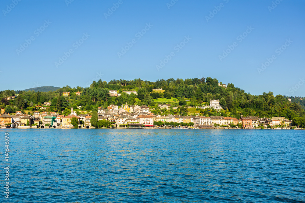 View of Motta square on Orta San Giulio from a touristic boat, Lake Orta, Piedmont, Italy