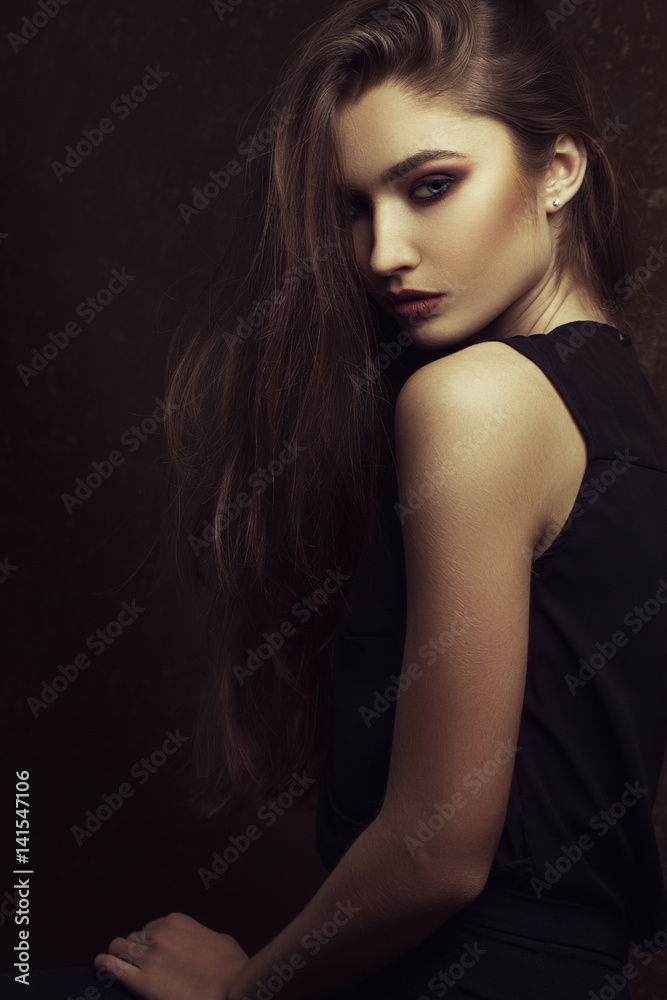 fashion portrait of elegant woman with perfect provocative make up. Studio shot