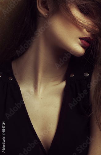 fashion portrait of elegant woman with perfect provocative make up. Studio shot