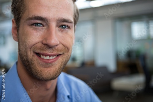 Male businesswoman smiling at camera