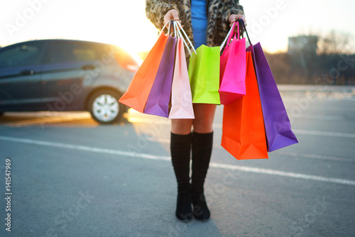 Woman holding her shopping bags in her hand
