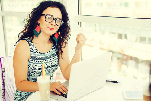 Young woman making online payment with credit card. Shopping online.Concept of new age in banking and plastic money.