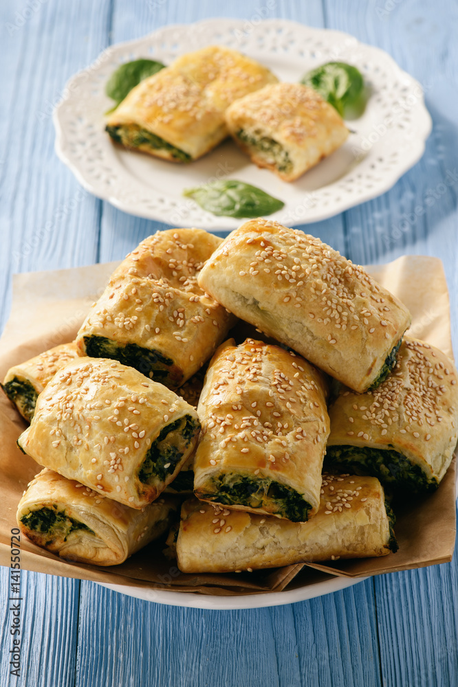 Puff pastry rolls  with spinach and ricotta.