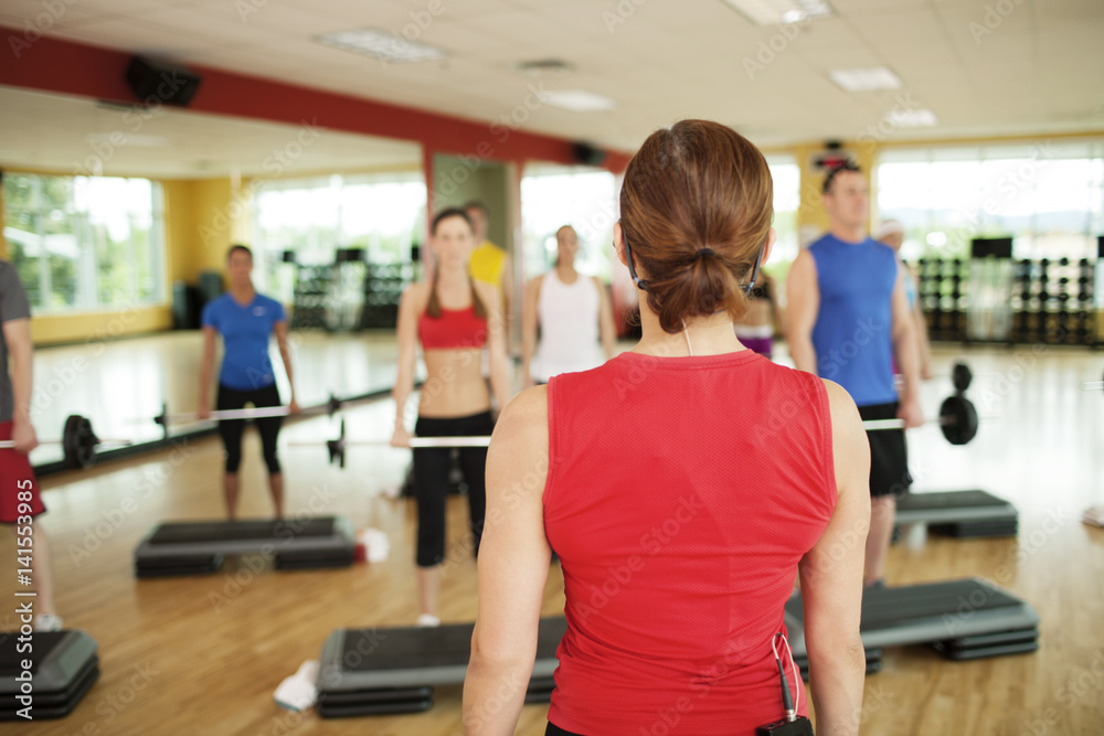 People training in exercise class People training in exercise class