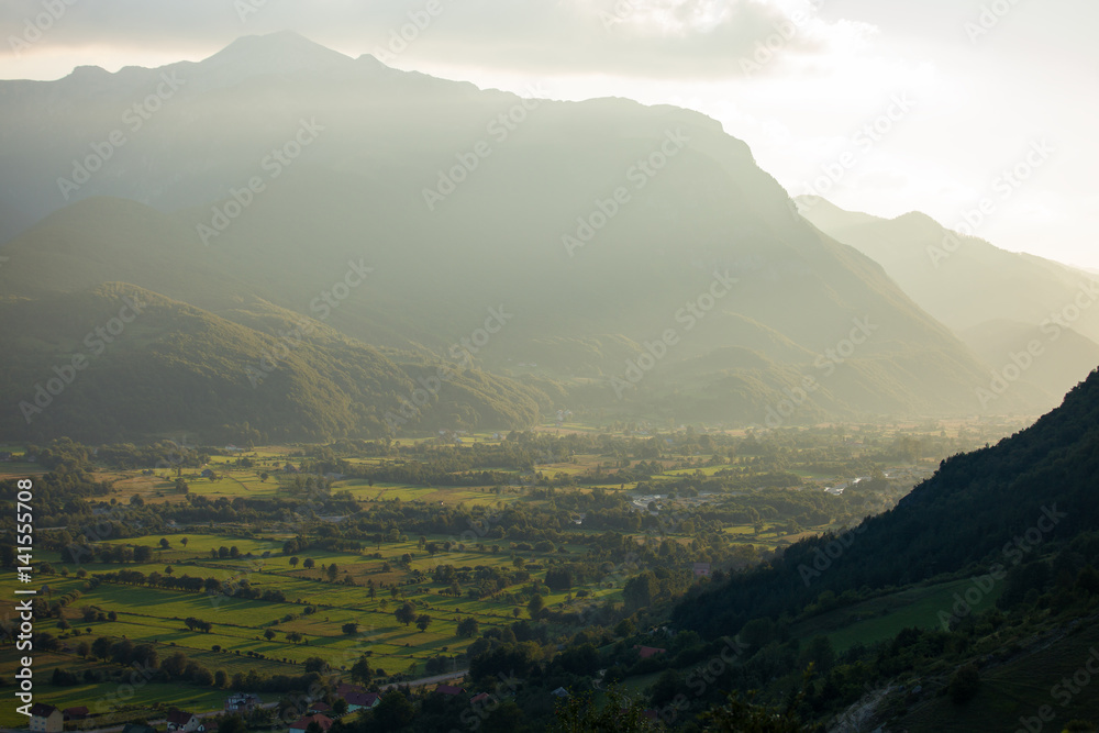 Amazing view of sunset in the valley. Gusinje town, Montenegro