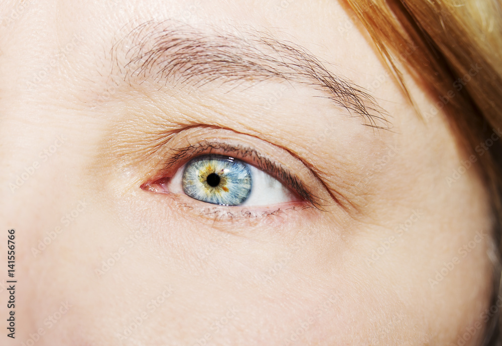 Fototapeta premium A beautiful insightful look woman's eye. Close up shot