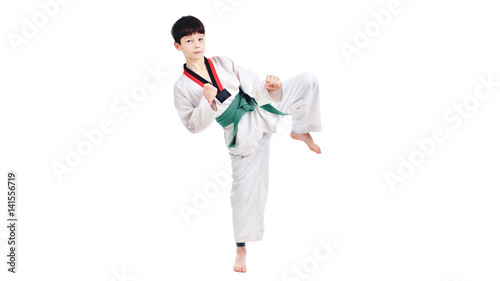 Young , preschool boy in kimono, isolated on white background