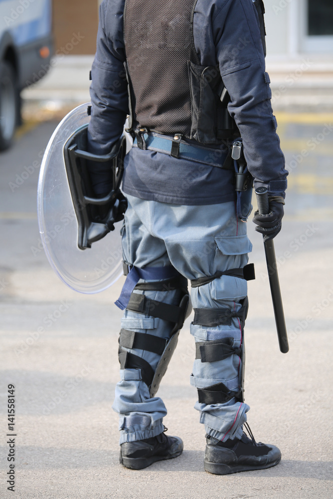 police in riot gear with batons and boots blacks police in riot gear with batons and boots blacks