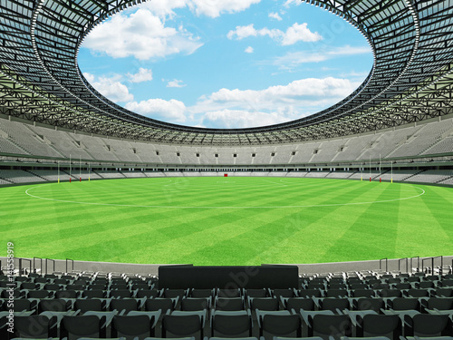 3D render of a round Australian rules football stadium with white seats and VIP boxes