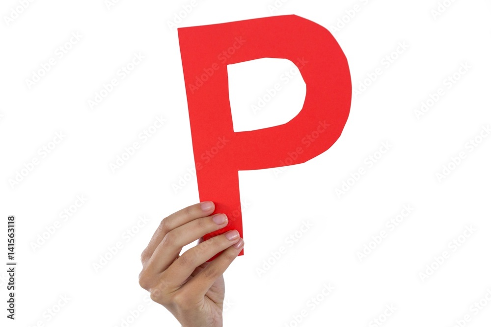 Businesswoman holding an alphabet p Businesswoman holding an alphabet p