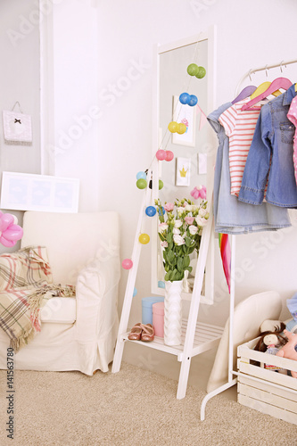 Beautiful interior of child's room decorated for birthday celebration © Africa Studio