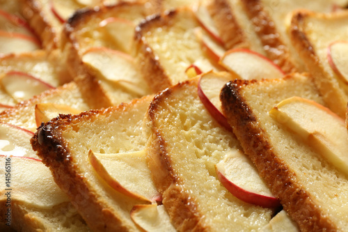 Tasty bread pudding with apple, closeup