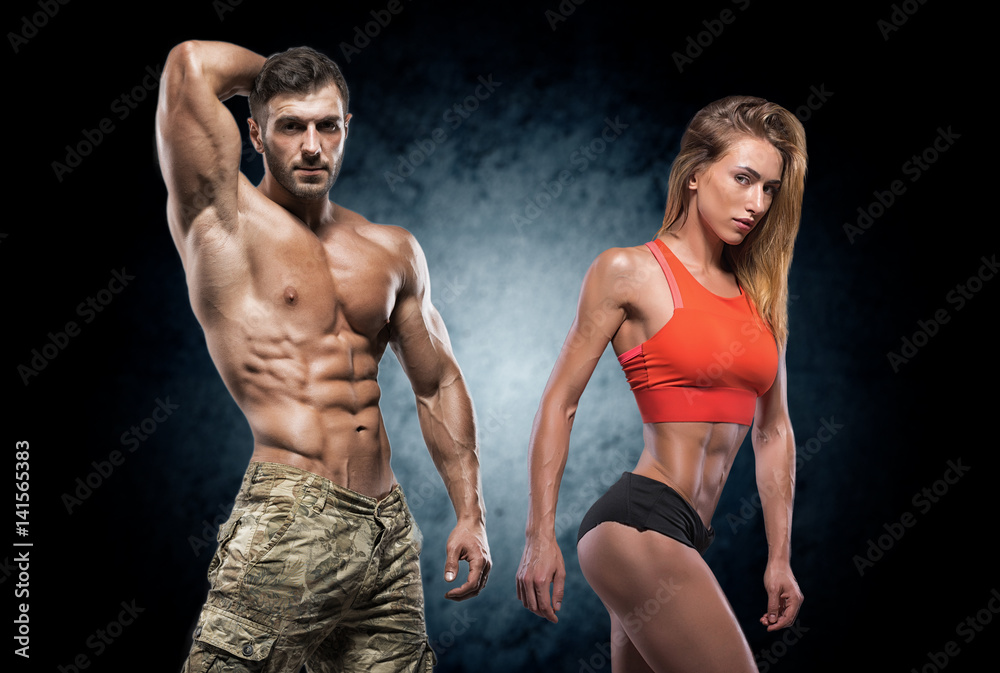 Athletic man and woman. Fitness couple. Athletic man and woman. Fitness couple.