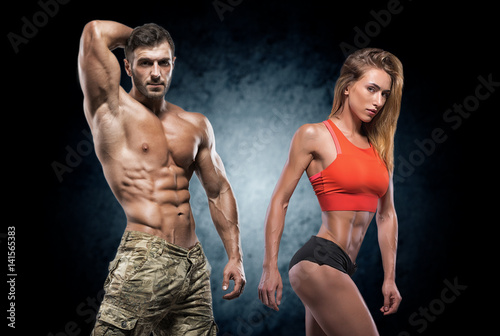 Athletic man and woman. Fitness couple. © bondarchik