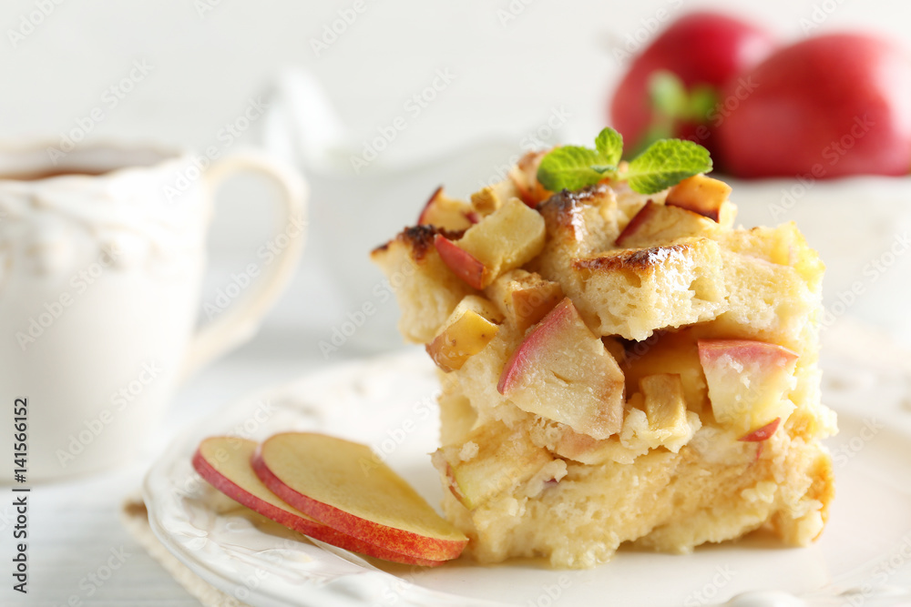 Delicious bread pudding with apple on plate Delicious bread pudding with apple on plate