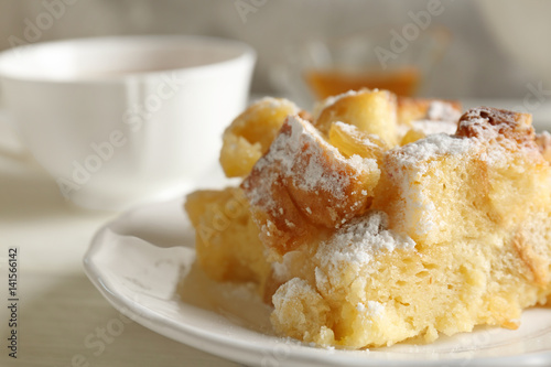 Delicious bread pudding with sugar powder on plate