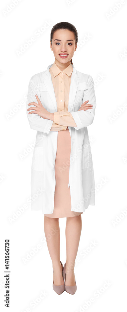 Young woman pharmacist with crossed arms on white background Young woman pharmacist with crossed arms on white background