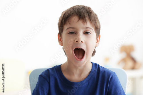 Cute little boy on blurred ...
