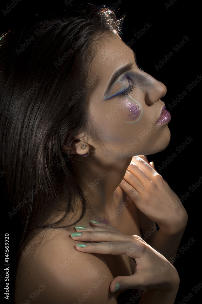 Portrait of a young girl with artistic make up Portrait of a young girl with artistic make up