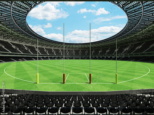 3D render of a round Australian rules football stadium with  black seats and VIP boxes