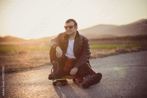 skater relaxing on the street