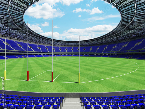 3D render of a round Australian rules football stadium with  blue seats and VIP boxes