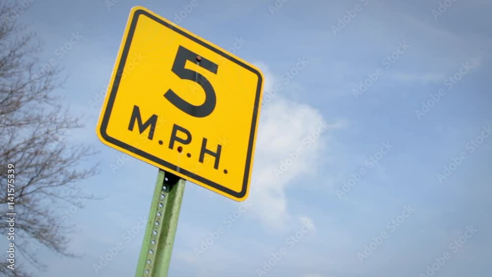 Five Miles an Hour Speed Limit Yellow Caution Sign Five Miles an Hour Speed Limit Yellow Caution Sign
