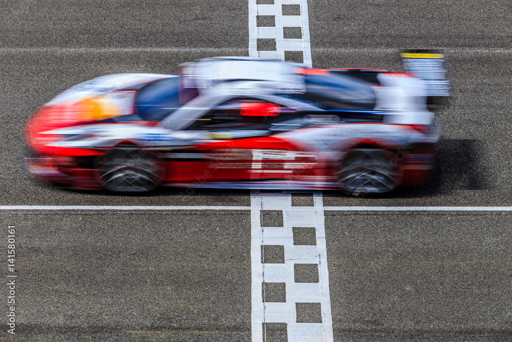 Fototapeta premium Motion blur, wyścigi samochodowe wyścigowe na torze prędkości