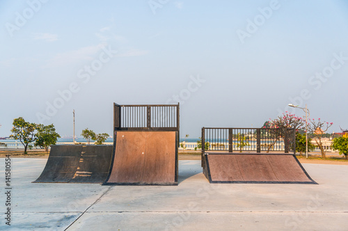 playground for practicing skateboarding or adventrure sport in public park at sriracha, chonburi, thailand photo